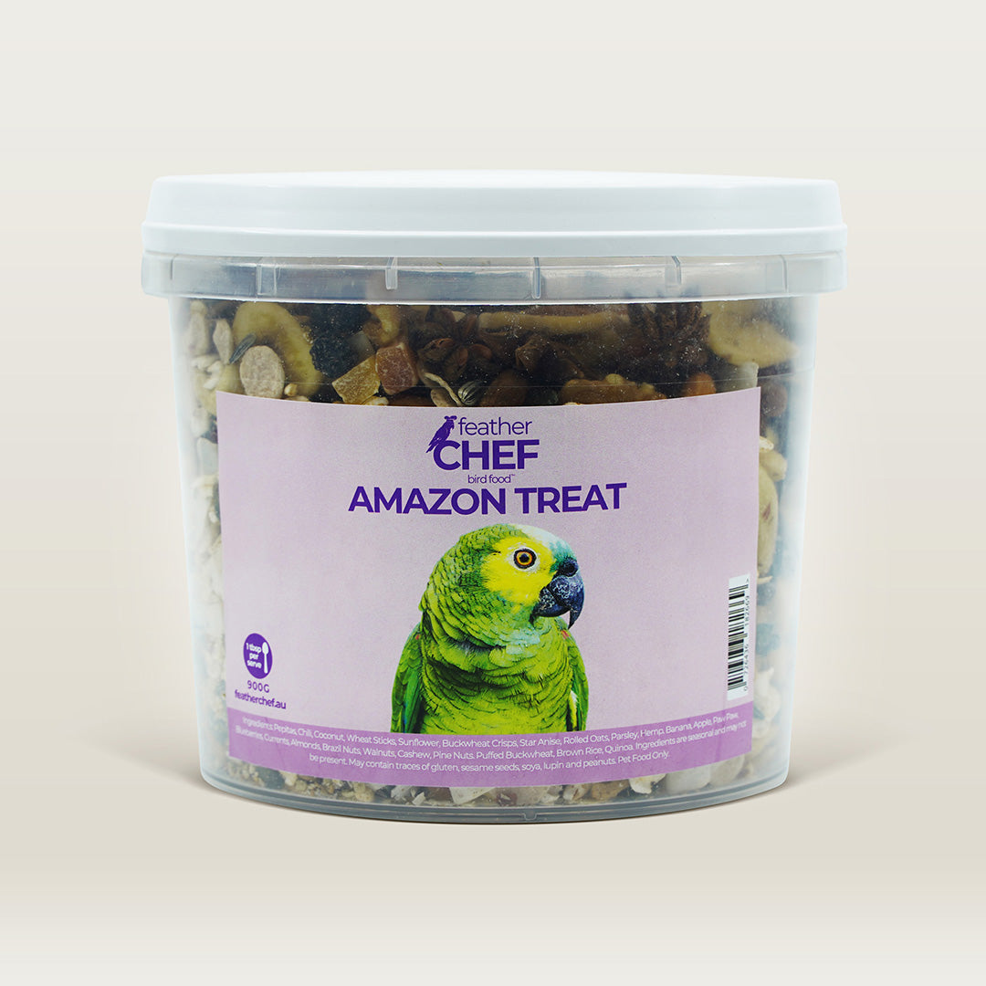 Container of Feather Chef Amazon Treats with a parrot on the label against a beige background
