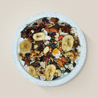 Feather Chef Amazon Treats in a bowl on a beige background