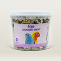 Container of Feather Chef Lovebird Treats with Lovebirds on a label against a beige background