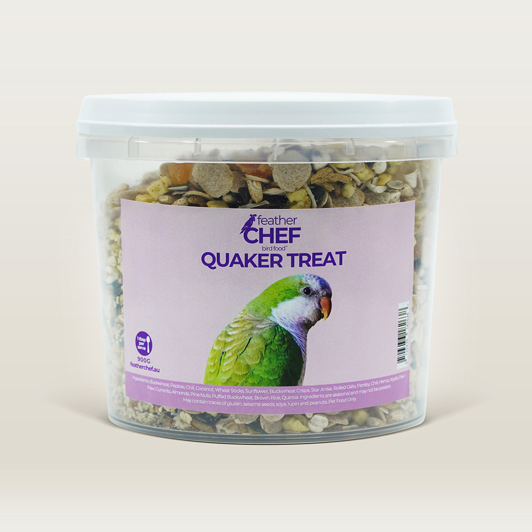 Container of Feather Chef Quaker Treats for birds on a beige background