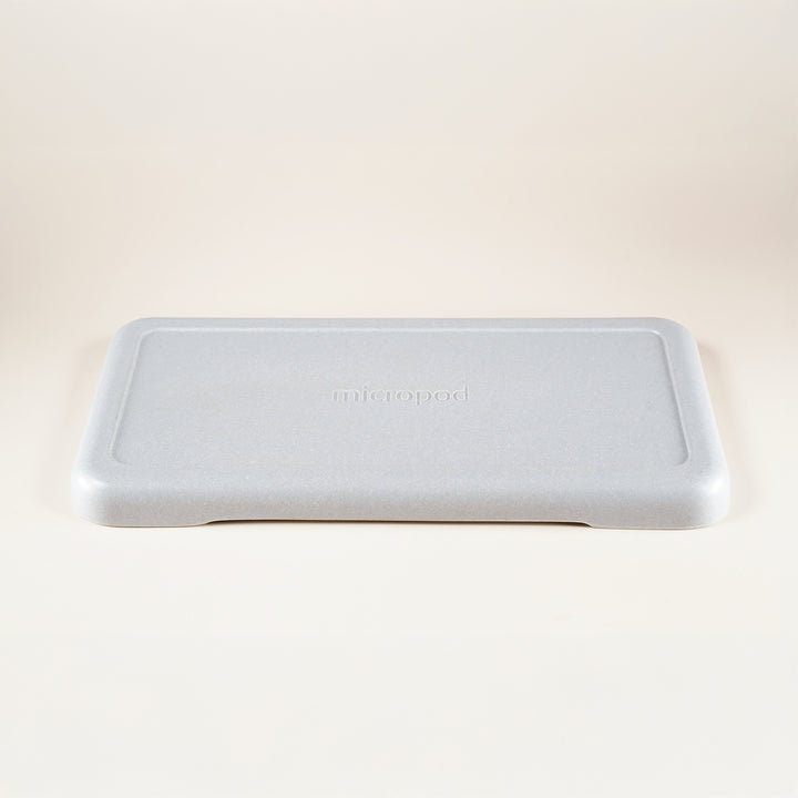 Micropod large lid in stone colour, designed to cover trays during germination for clean, mess-free microgreens growth with Seed Cube feeding.