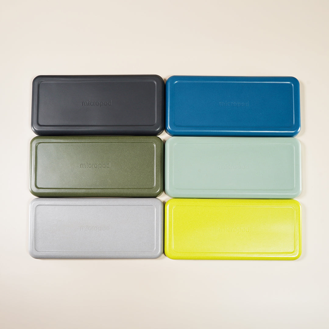 Lineup of Micropod large lids in multiple colours, designed for covering trays during germination to support healthy microgreens growth with Seed Cube feeding.