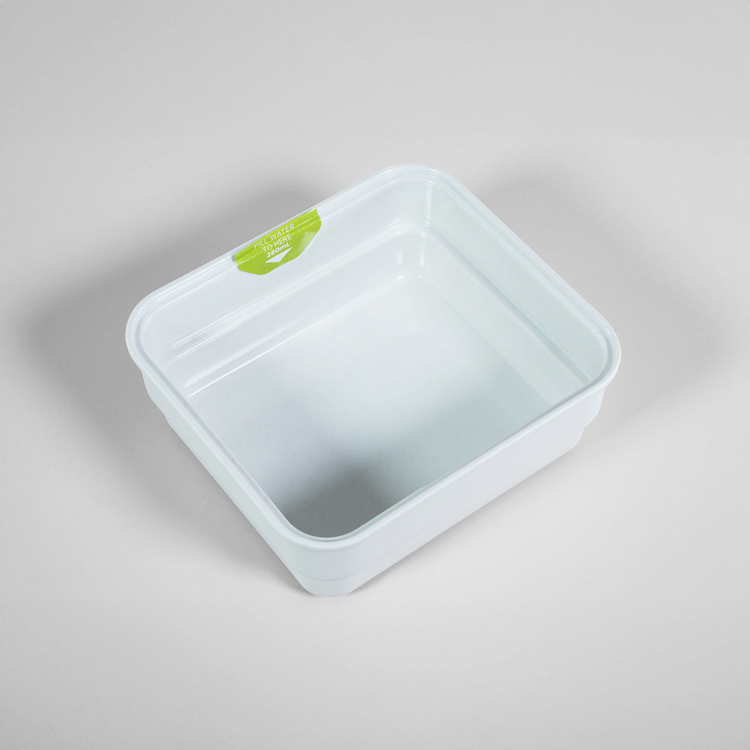 Micropod Mini grow tray for cultivating fresh microgreens at home, a compact soil-free system that works with Seed Cube bird feeding.