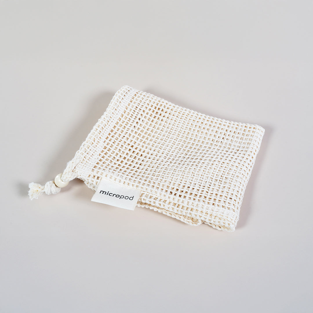 Micropod reusable produce bag folded for storage, an eco-friendly accessory for carrying or storing microgreens with Seed Cube feeding.
