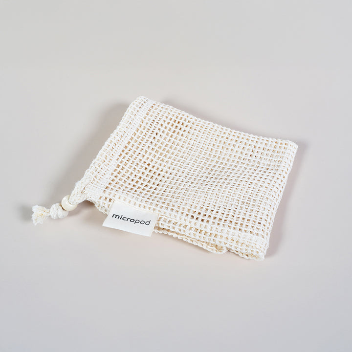 Micropod reusable produce bag folded for storage, an eco-friendly accessory for carrying or storing microgreens with Seed Cube feeding.