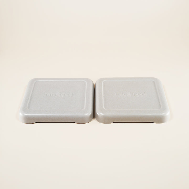 Micropod small lids twin pack in stone colour, designed for the Continuous Grow Kit to cover trays during germination and support microgreens growth with Seed Cube feeding.