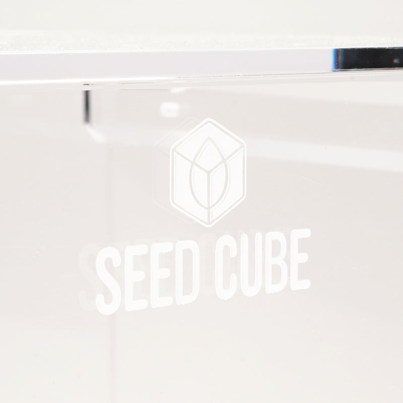 Large Seed Cube no-mess feeder mounted in an aviary, linking to the Seed Cube size guide